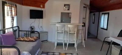 a small room with a bar in a tiny house at Garičkina kuća 2 in Pirot