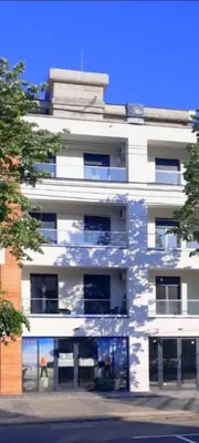 a large white building with a lot of windows at Studio Kalina in Vrnjačka Banja