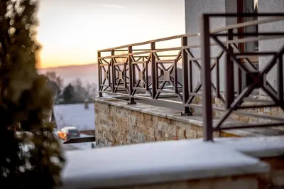 a balcony with a metal railing on a building at Alethea Lux Apartments, Milmari Resort Kopaonik in Kopaonik