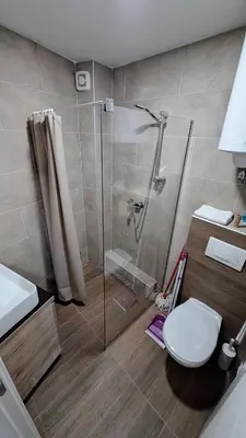 a bathroom with a shower and a toilet at Kopaonik - Milmari resort S65 in Kopaonik