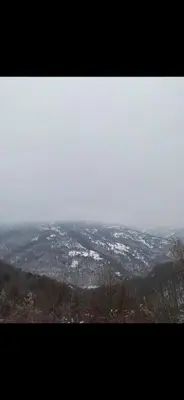 a view of a city from the top of a mountain at ANN III in Vlasina Rid