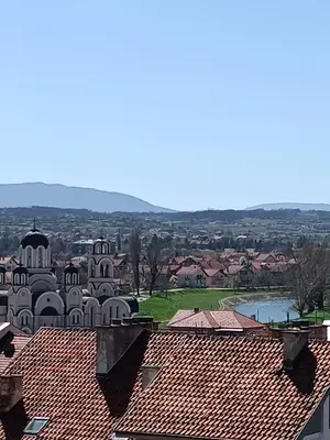 a view of a city with buildings and roofs at Apartman MIKA in Zaječar