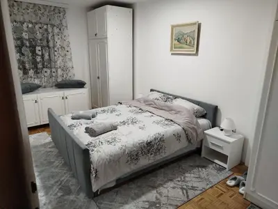 a bedroom with a bed in a room at Apartman NINASTA in Pirot