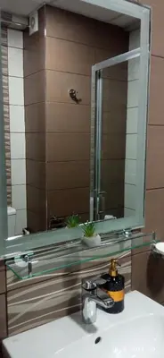 a bathroom with a sink and a mirror at Emili lux in Jagodina