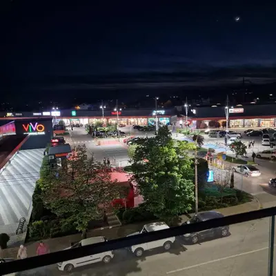 a view of a parking lot at night at Emili lux in Jagodina