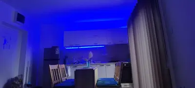 a blue room with a kitchen with a blue ceiling at Apartman VRH in Vrnjačka Banja
