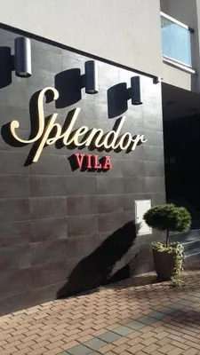 a sign on the side of a building at Apartments Villa Splendor in Vrnjačka Banja