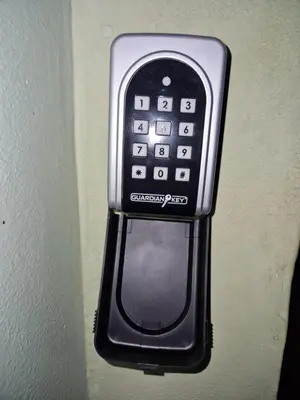 a cell phone is hanging on a wall at Apartment F.R.I.E.N.D.S in Paraćin