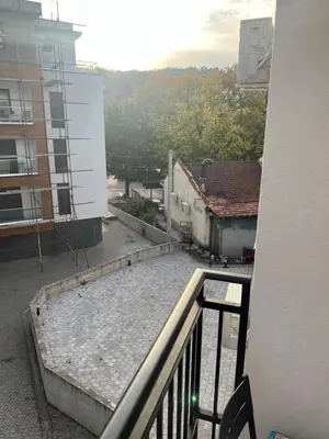 a view of a balcony from a building at Vrnjacka Renesansa Promenada in Vrnjačka Banja