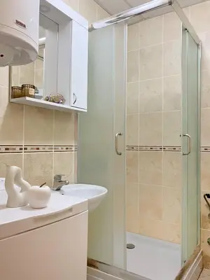a bathroom with a shower and a sink at Apartment, Vrnjacka-Banja, Raj in Vrnjačka Banja