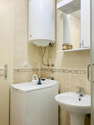 a small bathroom with a sink and a toilet at Apartment, Vrnjacka-Banja, Raj in Vrnjačka Banja