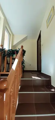 a set of stairs with christmas decorations on them at Apartments Villa Stars in Kopaonik