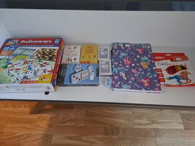 a table with many games and books on it at Hakuna Matata in Vrnjačka Banja