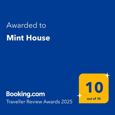 a yellow sign with the text wanted to mint house at Mint House in Niš