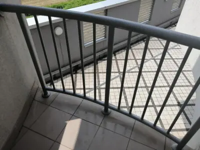 a view of a metal railing on a balcony at Jagodina Wing Apartman 2 in Jagodina