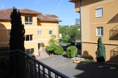 a view from the balcony of a building at Apartman Lorenzo in Vrnjačka Banja