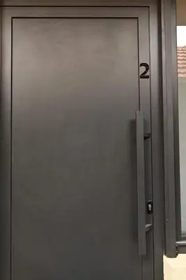 a metal door with a handle on a building at Paradiso 2 in Leskovac