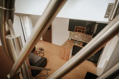 an overhead view of a living room with a couch at Vila-L&M- Royal in Lipova