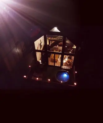 an overhead view of a stage with lights in the dark at Ski & Spa Bungalows in Kopaonik