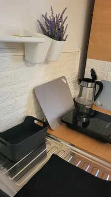 a coffee maker sitting on top of a table at Studio Janko in Vrnjačka Banja