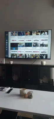 a flat screen tv sitting on top of a table at Cera premium apartment in Soko Banja