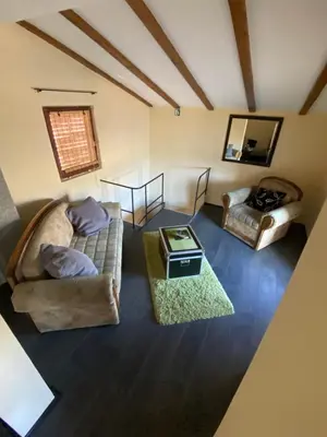 a living room with a couch and a table at s t d -PARADISO- in Vranje