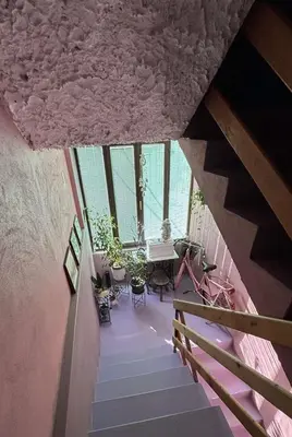 an overhead view of a room with stairs and windows at Apartmani Milanović Jagodina in Jagodina