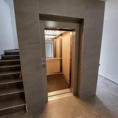a hallway with a stairway leading to a room at Studio Vera in Kruševac