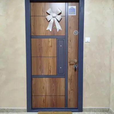 a wooden door with a bow on it at Cera luxe apartment 2 in Soko Banja