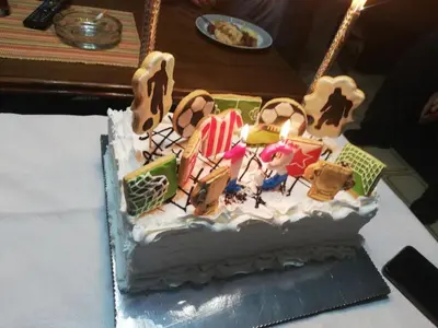 a birthday cake sitting on top of a table at Apartmani Feliks in Resavica