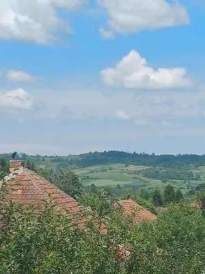 a view of the countryside from a roof at Seosko Domaćinstvo Jevtić in Ždraljica