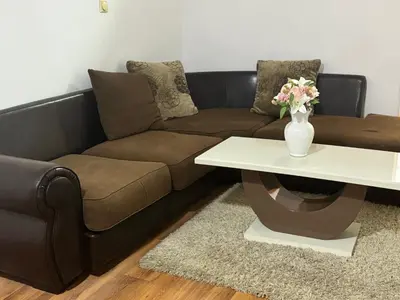 a living room with a couch and a coffee table at Jelena in Vranje
