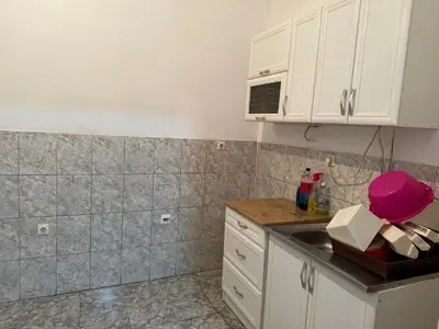 a kitchen with a sink and a counter top at Jelena in Vranje