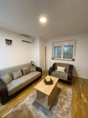 a living room with a couch and a coffee table at Rtanj in Soko Banja
