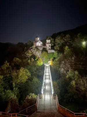 a house on top of a hill at night at Lola in Prolomska Banja