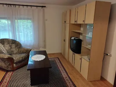 a living room with a couch and a coffee table at Studio Petrović in Soko Banja