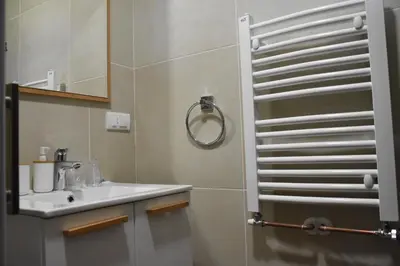 a bathroom with a sink and a mirror at Kod Bogdanovica in Vrtovac