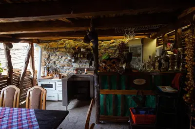 a kitchen with a stove and a stove top oven at Porodična kuća Vitina Iža in Pirot