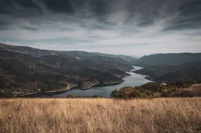 a view of a river in a valley with mountains at Porodična kuća Vitina Iža in Pirot