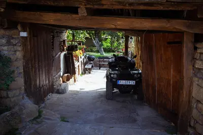 a motorcycle parked in the entrance to a building at Porodična kuća Vitina Iža in Pirot
