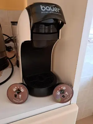 a coffee maker sitting on top of a shelf at Soko Banjica in Soko Banja