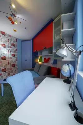 a room with a bed and a desk with a lamp at Lux 010 in Pirot