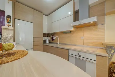 a kitchen with a sink and a counter top at Lux 010 in Pirot