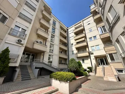 an apartment building with stairs in front of it at Pahira Lux in Paraćin
