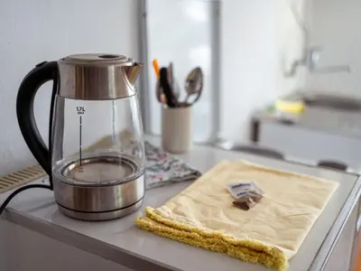 a blender sitting on a counter with a napkin at Apartman Ristić in Vranje
