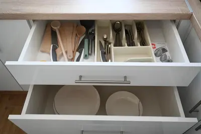 a kitchen drawer filled with lots of kitchen utensils at Apartman Vera 8 VRNJAČKA BANJA in Vrnjačka Banja