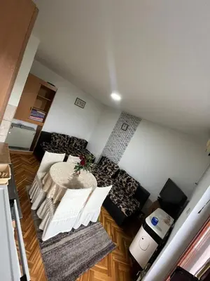 an overhead view of a living room with a table at Apartman Sanja 3 in Vrnjačka Banja