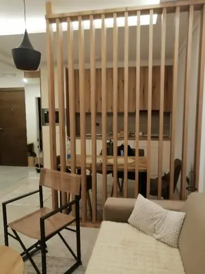 a living room with a couch and a chair at Husky N in Raška