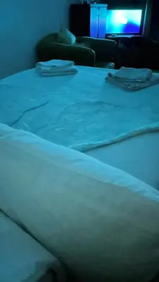 a close up of a bed in a room at Stan na Dan - Centar - Besplatan parking in Niš