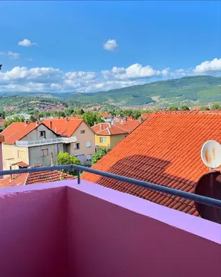 a view of a city with orange roofs at Happy Place Apartment Pirot in Pirot